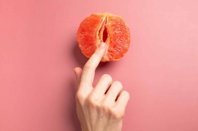 A woman is holding a grapefruit by her panties. Concept masturbation. High quality photo | Meraki Aesthetics and Company PLLC | Cornelius, NC